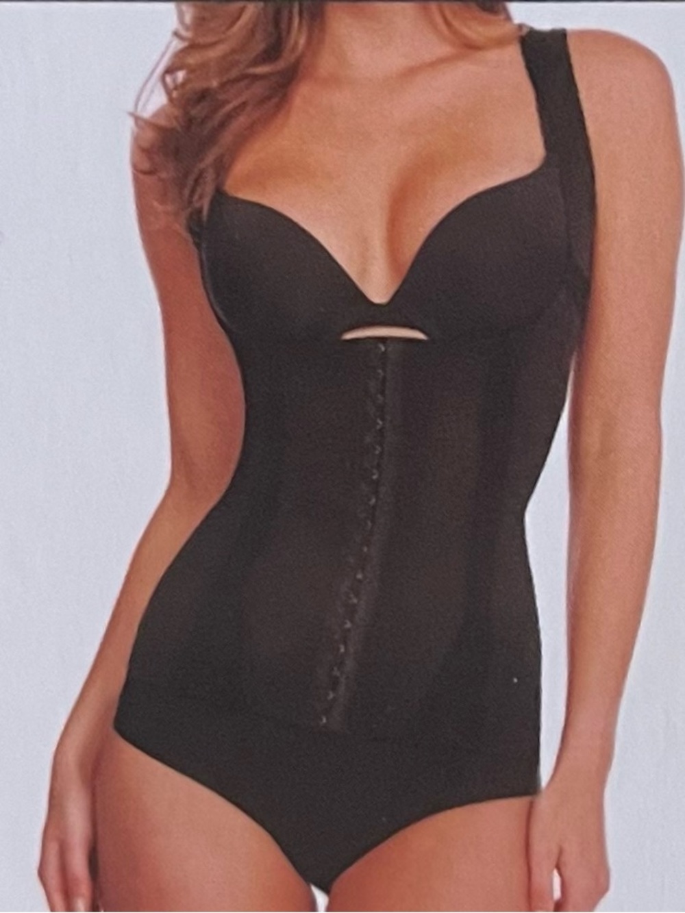 New with tags Daisy Fuentes Intimates Waist Cinching Torset in black, size XL.